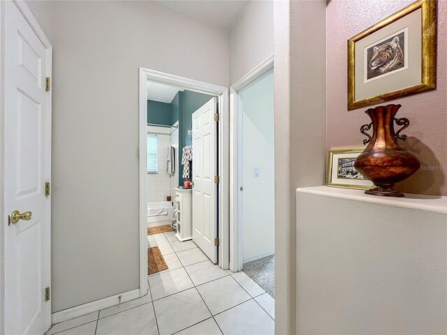 1701 Lucky Pennie Way, Apopka, FL 32712 - corridor with light tile patterned flooring and baseboards