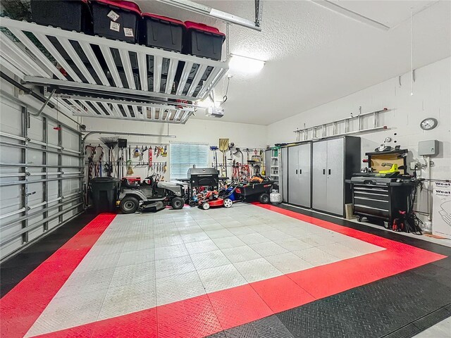 1701 Lucky Pennie Way, Apopka, FL 32712 - garage with a garage door opener