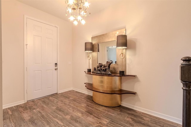 13940 Magnolia Ridge Loop, Winter Garden, FL 34787 - foyer with wood finished floors, a chandelier, and baseboards