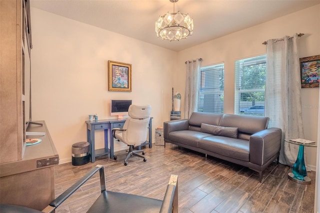 13940 Magnolia Ridge Loop, Winter Garden, FL 34787 - home office featuring wood finished floors, a chandelier, and baseboards