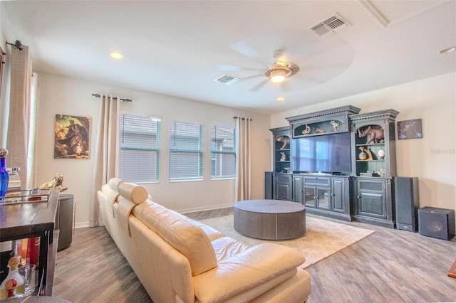 13940 Magnolia Ridge Loop, Winter Garden, FL 34787 - living area featuring light wood finished floors, ceiling fan, recessed lighting, and baseboards