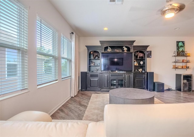 13940 Magnolia Ridge Loop, Winter Garden, FL 34787 - living room featuring light wood finished floors, ceiling fan, baseboards, and recessed lighting