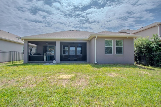 13940 Magnolia Ridge Loop, Winter Garden, FL 34787 - rear view of house with a sunroom and stucco siding