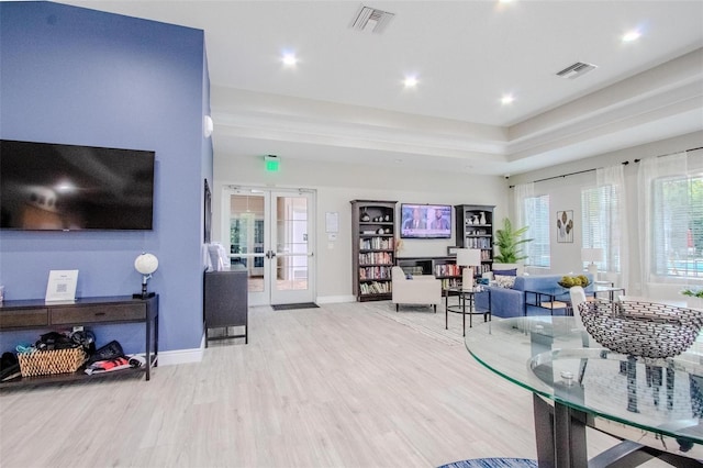 13940 Magnolia Ridge Loop, Winter Garden, FL 34787 - living room with french doors, wood finished floors, recessed lighting, and baseboards