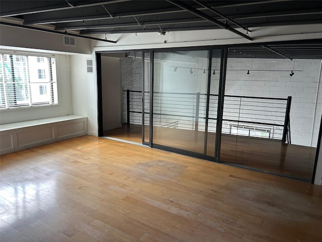 62 W Colonial Dr Unit 302, Orlando, FL 32801 - basement with light wood finished floors