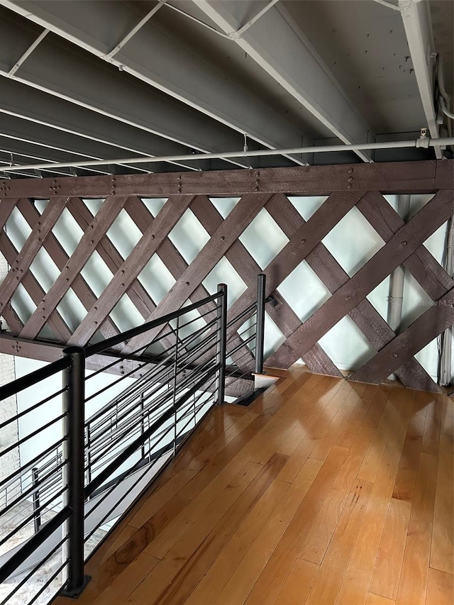 62 W Colonial Dr Unit 302, Orlando, FL 32801 - stairway with hardwood / wood-style flooring