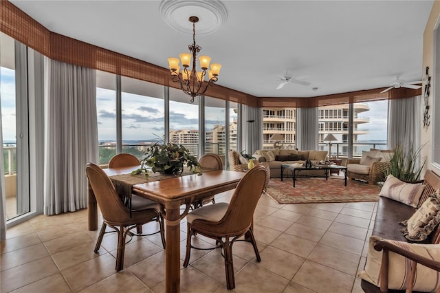 3010 Grand Bay Blvd Unit 472, Longboat Key, FL 34228 - sunroom with healthy amount of natural light and a chandelier