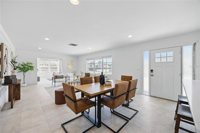 3528 Casablanca Ave, Saint Petersburg, FL 33706 - dining space with recessed lighting and light tile patterned floors