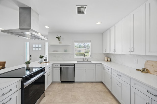 3528 Casablanca Ave, Saint Petersburg, FL 33706 - kitchen with stainless steel dishwasher, electric range, a sink, wall chimney range hood, and open shelves