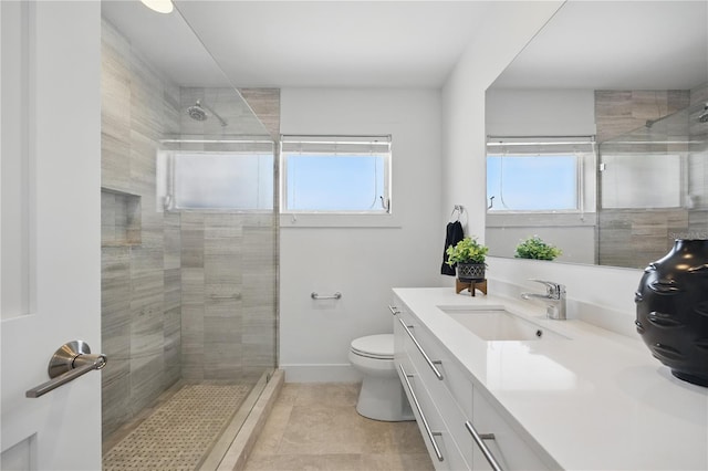 3528 Casablanca Ave, Saint Petersburg, FL 33706 - full bathroom featuring vanity, toilet, tiled shower, and baseboards