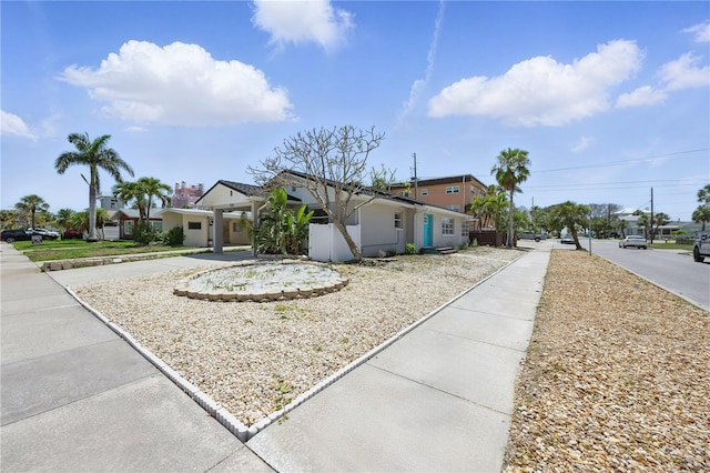 3528 Casablanca Ave, Saint Petersburg, FL 33706 - view of front facade with stucco siding and a residential view