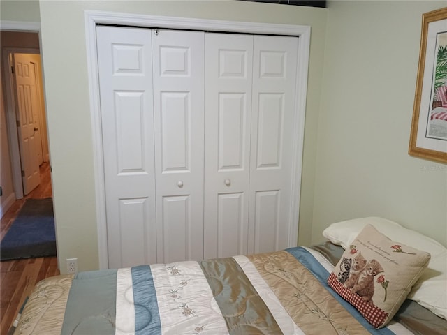 2474 Cimmaron Ash Way, Apopka, FL 32703 - bedroom featuring wood finished floors and a closet