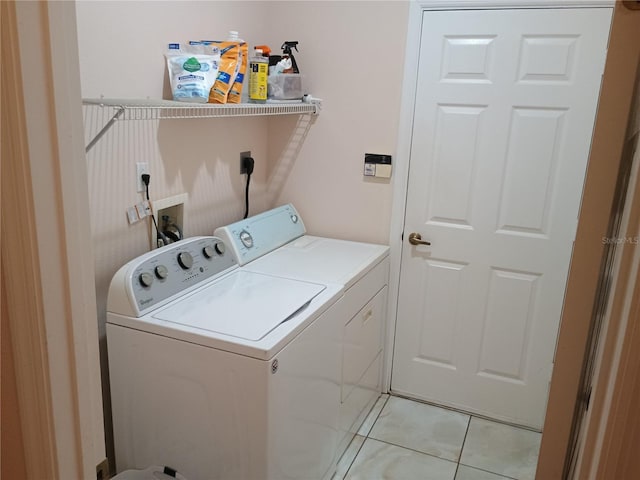 2474 Cimmaron Ash Way, Apopka, FL 32703 - washroom with washing machine and dryer and light tile patterned floors