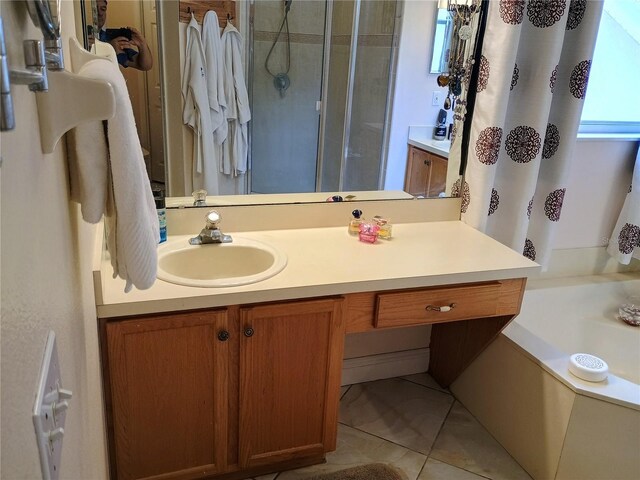 2474 Cimmaron Ash Way, Apopka, FL 32703 - full bathroom with a stall shower, vanity, a bath, and tile patterned flooring