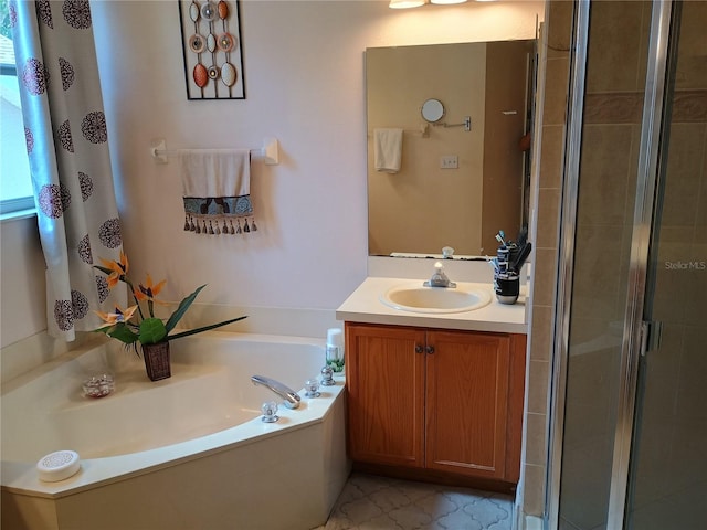 2474 Cimmaron Ash Way, Apopka, FL 32703 - full bathroom with a shower stall, vanity, and a garden tub