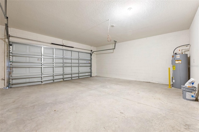 5625 Brosnan Rd, Saint Cloud, FL 34771 - garage featuring electric water heater and concrete block wall
