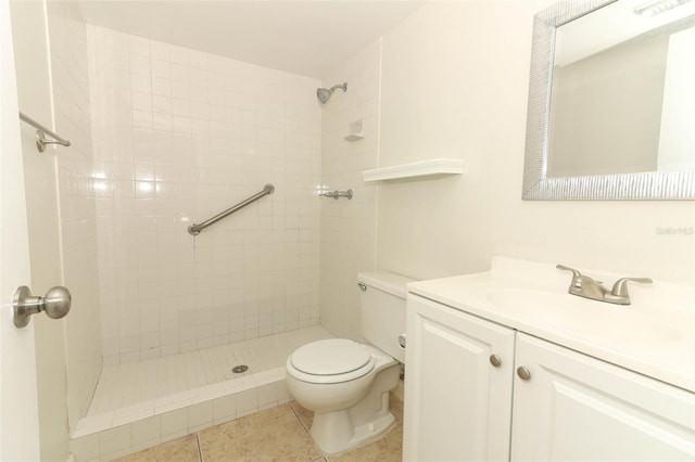 1221 S Pine Ridge Cir Unit A2, Sanford, FL 32773 - bathroom with vanity, a tile shower, toilet, and tile patterned flooring
