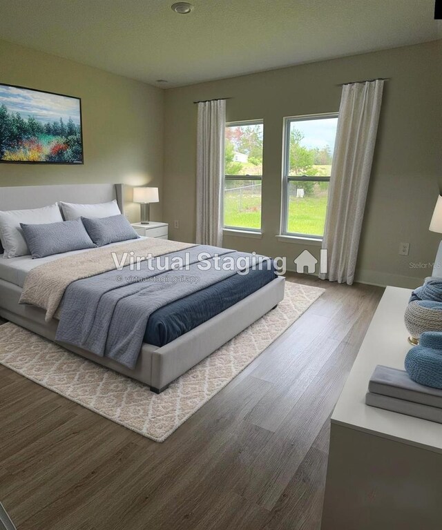 524 Marion Oaks Blvd, Ocala, FL 34473 - bedroom featuring wood finished floors