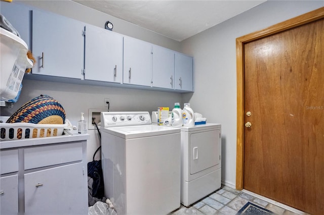 616 Magnolia St, Windermere, FL 34786 - laundry room featuring cabinet space and washer and clothes dryer