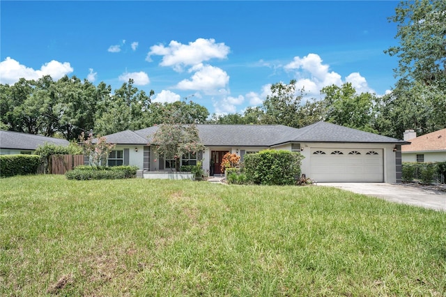 616 Magnolia St, Windermere, FL 34786 - ranch-style house with an attached garage, driveway, and stucco siding