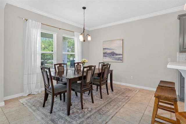 15318 Sandfield Loop, Winter Garden, FL 34787 - dining room with ornamental molding, light tile patterned floors, and baseboards