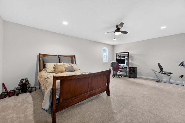 15318 Sandfield Loop, Winter Garden, FL 34787 - bedroom with light colored carpet, a desk, baseboards, a ceiling fan, and recessed lighting