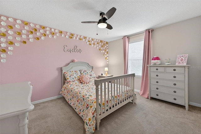 15318 Sandfield Loop, Winter Garden, FL 34787 - bedroom featuring carpet, a textured ceiling, a ceiling fan, and baseboards