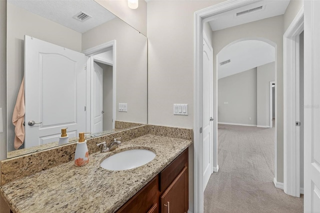 15318 Sandfield Loop, Winter Garden, FL 34787 - bathroom with vanity and baseboards