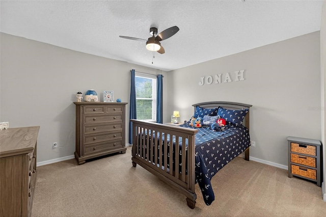 15318 Sandfield Loop, Winter Garden, FL 34787 - bedroom featuring carpet flooring, baseboards, ceiling fan, and a textured ceiling