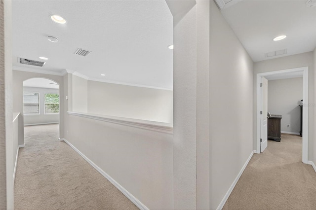 15318 Sandfield Loop, Winter Garden, FL 34787 - corridor featuring carpet floors, baseboards, recessed lighting, ornamental molding, and arched walkways
