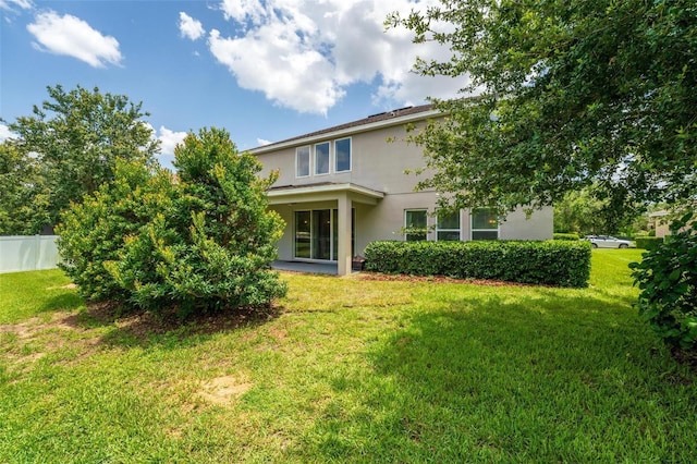15318 Sandfield Loop, Winter Garden, FL 34787 - back of property featuring stucco siding