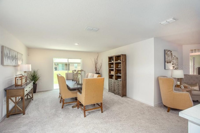 8624 N Pitcairn Way, Citrus Springs, FL 34434 - dining area with light carpet and baseboards