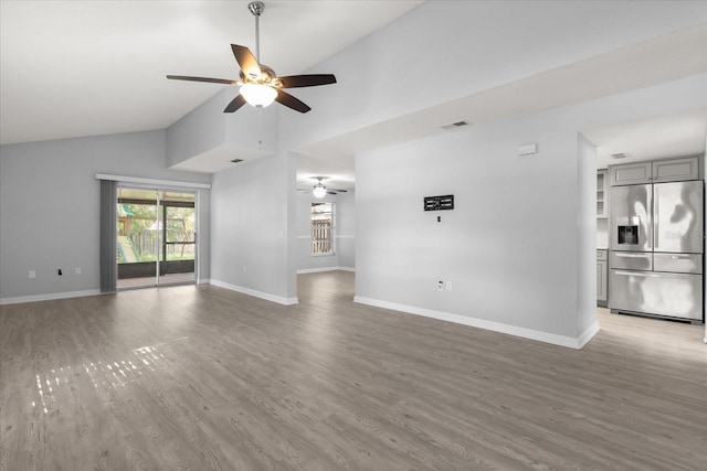 2751 Wentworth Pl, Cocoa, FL 32926 - unfurnished living room featuring ceiling fan, light wood-style flooring, and high vaulted ceiling