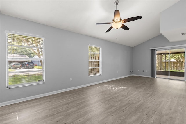 2751 Wentworth Pl, Cocoa, FL 32926 - spare room featuring lofted ceiling, wood finished floors, and ceiling fan