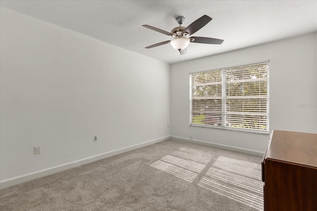 2751 Wentworth Pl, Cocoa, FL 32926 - spare room featuring a ceiling fan and light carpet