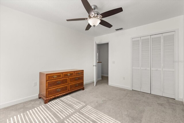 2751 Wentworth Pl, Cocoa, FL 32926 - unfurnished bedroom featuring carpet floors, a closet, and ceiling fan