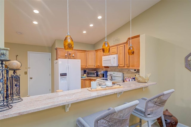 5323 Concord Way, Fort Myers, FL 33907 - kitchen with white appliances, tasteful backsplash, decorative light fixtures, recessed lighting, and light stone counters