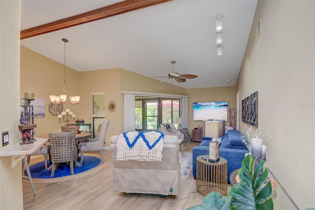 5323 Concord Way, Fort Myers, FL 33907 - living area with wood finished floors, a chandelier, and a ceiling fan
