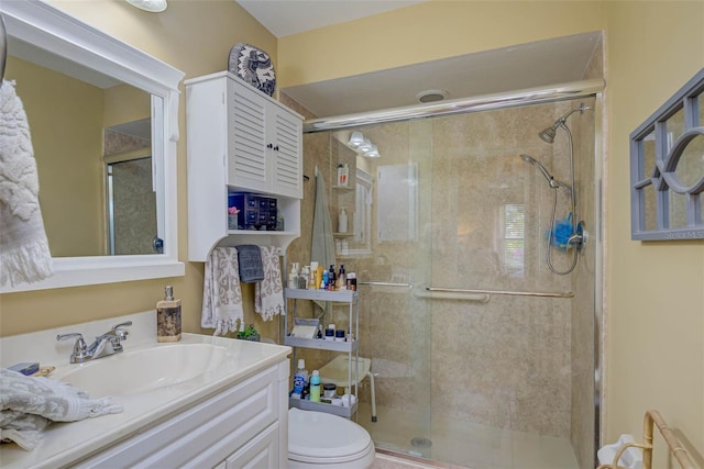 5323 Concord Way, Fort Myers, FL 33907 - bathroom featuring vanity, a stall shower, and toilet