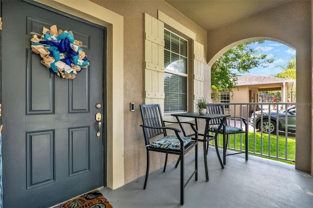 15613 Camp Dubois Cres, Winter Garden, FL 34787 - entrance to property featuring stucco siding and covered porch