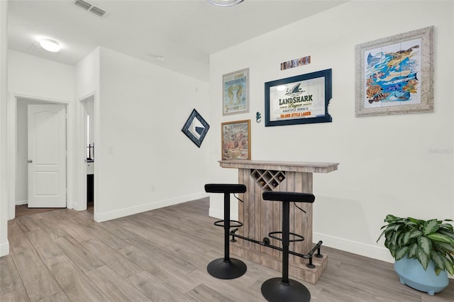 15613 Camp Dubois Cres, Winter Garden, FL 34787 - bar featuring baseboards and wood finished floors