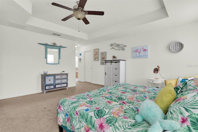 15613 Camp Dubois Cres, Winter Garden, FL 34787 - bedroom featuring a raised ceiling, carpet, baseboards, and ceiling fan