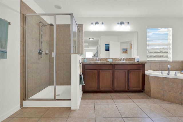 15613 Camp Dubois Cres, Winter Garden, FL 34787 - full bath featuring a bath, a shower stall, double vanity, and tile patterned floors