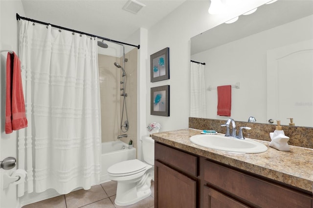 15613 Camp Dubois Cres, Winter Garden, FL 34787 - full bathroom featuring vanity, shower / tub combo, tile patterned flooring, and toilet