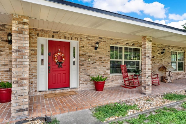 1778 Woodcrest Ln, Deland, FL 32720 - property entrance with covered porch and brick siding