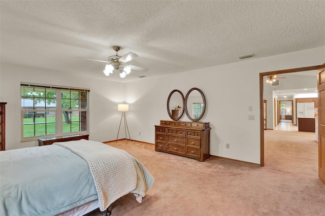 1778 Woodcrest Ln, Deland, FL 32720 - bedroom with light carpet, a textured ceiling, and ceiling fan