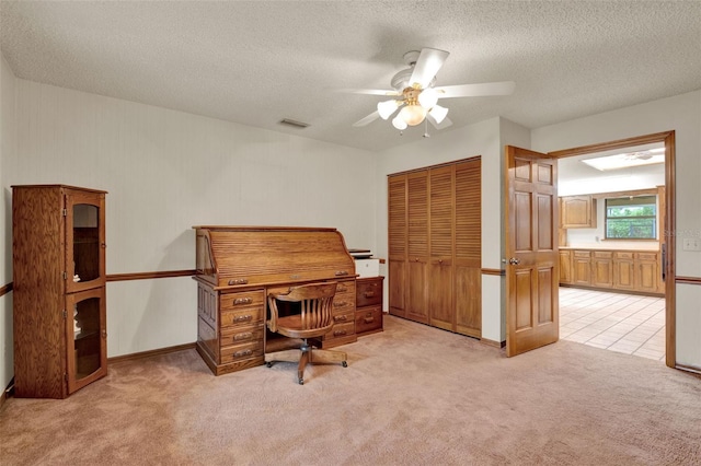 1778 Woodcrest Ln, Deland, FL 32720 - home office with light colored carpet, ceiling fan, and a textured ceiling
