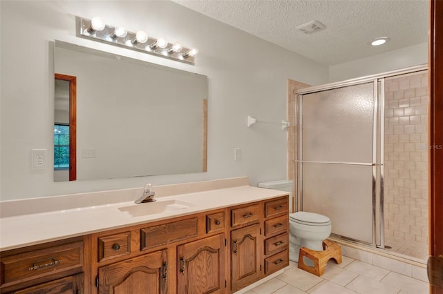 1778 Woodcrest Ln, Deland, FL 32720 - full bathroom featuring vanity, a stall shower, a textured ceiling, and tile patterned floors