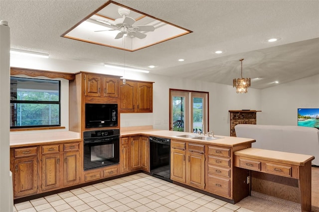 1778 Woodcrest Ln, Deland, FL 32720 - kitchen featuring black appliances, a peninsula, brown cabinets, light countertops, and recessed lighting