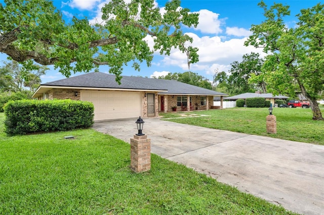 1778 Woodcrest Ln, Deland, FL 32720 - ranch-style house with driveway, a garage, and brick siding